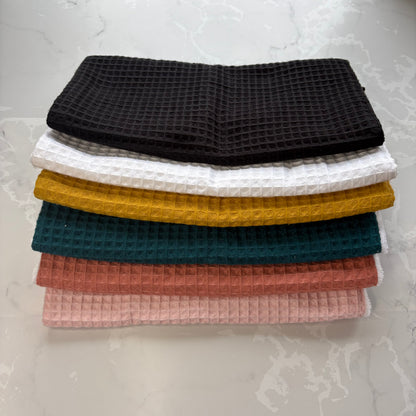 serviettes visage de différentes couleurs en éponge bambou et nid d'abeille